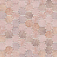 Rose pink zellige hexagon tile laid in a honeycomb pattern with light grout