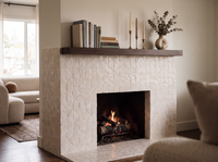 Cloud Triangle Zellige Mosaic Sheet installed on a handmade fireplace surround