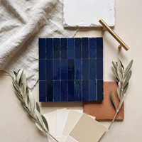 Cobalt Blue Talia Zellige Mosaic Sheet styled on a designer mood board with linen, brass, and plaster