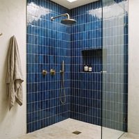 Cobalt Blue Talia Zellige Mosaic Sheet installed as a handmade bathroom shower wall