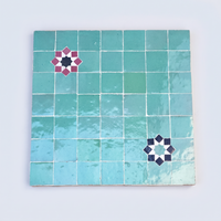 Square with Star Accents Zellige Mosaic Tile, Aqua, full 12x12in sheet on a light grey background
