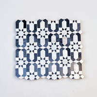 Andalusian Star Rosette Zellige Mosaic Tile, Navy & White, full 12x12in sheet on a light grey background