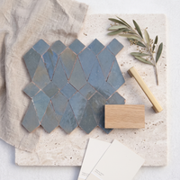 Hexagon Picket Zellige Mosaic Tile, Slate Blue, styled on a designer mood board with linen, brass, and oak