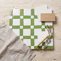 Windowpane Check Zellige Mosaic Tile, Lime Green & White, styled on a designer mood board with linen, brass, and oak