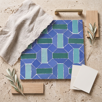 Basketweave Zellige Mosaic Tile, Cobalt, Emerald & Jade, styled on a designer mood board with linen, brass, and oak