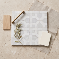 Interlocking Cross Zellige Mosaic Tile, White, styled on a designer mood board with linen, brass, and oak