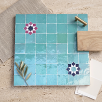 Square with Star Accents Zellige Mosaic Tile, Aqua, styled on a designer mood board with linen, brass, and oak
