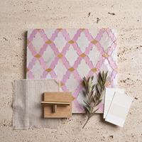 Moroccan Lattice Zellige Mosaic Tile, Lilac, Cream & Honey, styled on a designer mood board with linen, brass, and oak