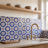 16 Point Star Rosette Zellige Mosaic Tile, Cobalt, Orange & White, 12x12in sheets installed as a handmade kitchen backsplash